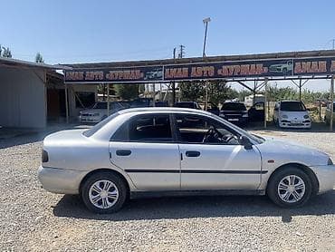 e39 540: Mitsubishi Carisma: 1998 г., Седан — 4