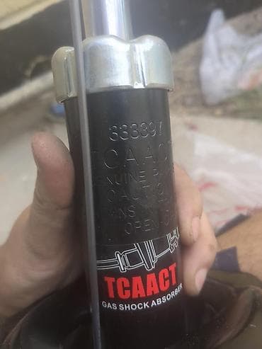 mini gps tracker: Передняя амортизационная стойка TCAACT (gas shock absorber) передний — 4