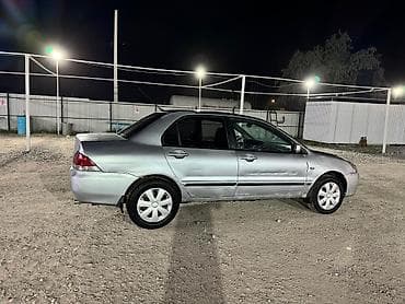 кира: Mitsubishi Lancer: 2004 г., 1.6 л, Автомат, Бензин, Седан — 4