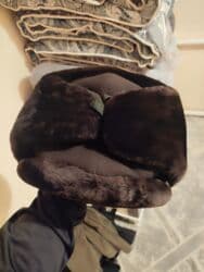 Продается шапка-ушанка
военная новая 62 размер 
цена 1000 сом