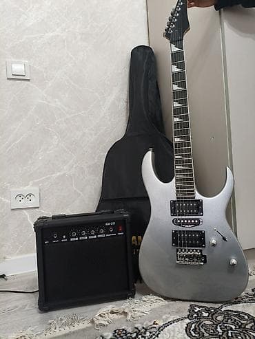 Электрогитара + комбоусилитель комплект Что включено: - Электрогитара