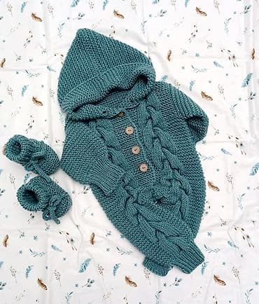 Вязаный комбинезон для новорожденных малышей