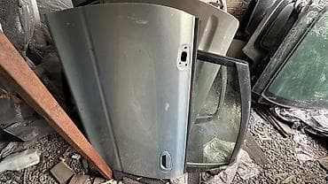 ист дверь: Автомобильная передняя дверь в сборе (каркас + стекло). - Материал — 1