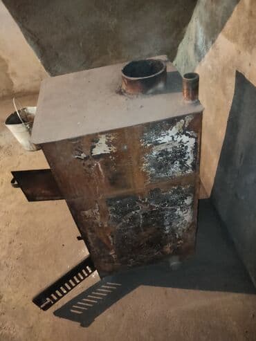 купить бочку для воды: Металлическая печь-буржуйка прямоугольной формы. Оснащена дверцами для — 4
