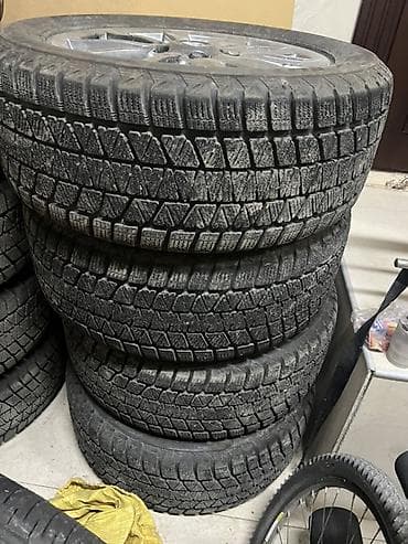 Унаа: Зимние шины Bridgestone Blizzak DM-V2 - Размер: 285/50 R20 - Индекс — 9