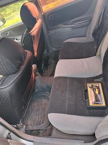 Mazda 626: 1999 г., 1.8 л, Ручные, Бензин, Седан