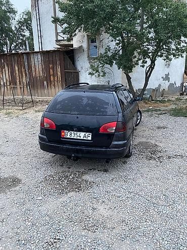 385 55: Продаётся универсал черного цвета. Основные характеристики: - Кузов — 4