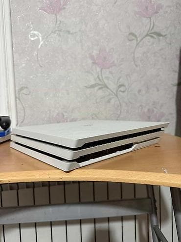 плайстейшен 4: Игровая консоль PlayStation 4 Pro (белая) Комплектация: - Консоль PS4 — 3