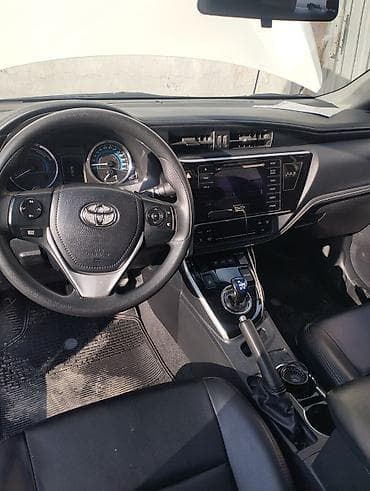 автомобил кия: Toyota Corolla: 2019 г., 1.8 л, Вариатор, Гибрид, Седан — 9