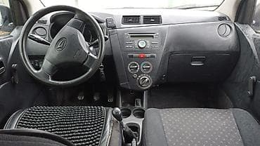 ls 400: Daihatsu Cuore: 2010 г., 1 л, Механика, Газ, Хэтчбэк — 4