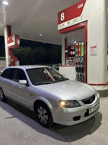 mazda 121: Mazda Familia: 2003 г., Автомат, Бензин, Хэтчбэк — 3