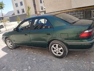 ом 422: Mazda 626: 1998 г., 1.8 л, Механика, Бензин, Седан — 2