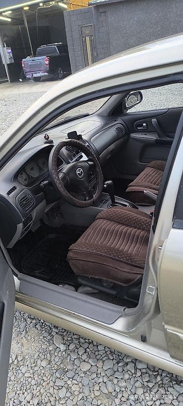 mazda 626 кронос: Mazda 323: 2003 г., 1.6 л, Автомат, Бензин, Хэтчбэк — 5