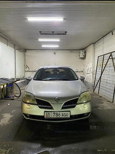зеркло: Nissan Primera: 2002 г., 2 л, Механика, Бензин, Лифтбек — 1