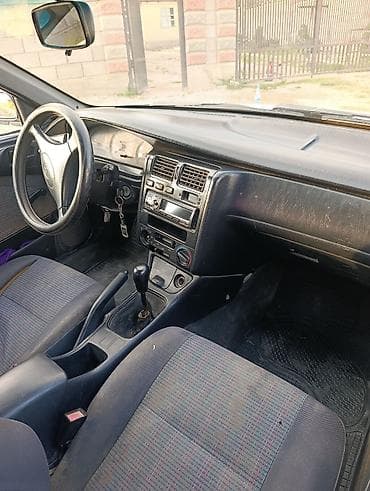 болон 12: Toyota Carina E: 1997 г., 1.6 л, Механика, Бензин, Седан — 6
