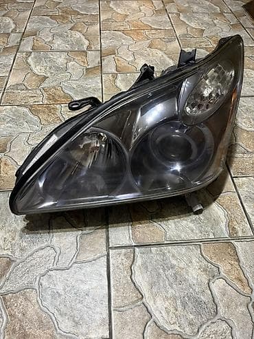 Унаа электрик тетиктери: Алдыңкы сол фара Toyota Оригинал, Жапония — 1