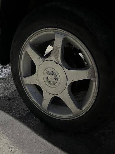 диски на 2115: Колеса в сборе 175 / 65 / R 14, Легковые, Литые, отверстий - 4 — 1
