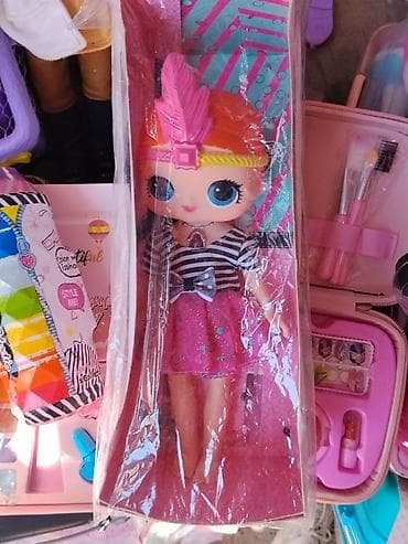 Кукла в стиле LOL с большими голубыми глазами и яркими рыжими
