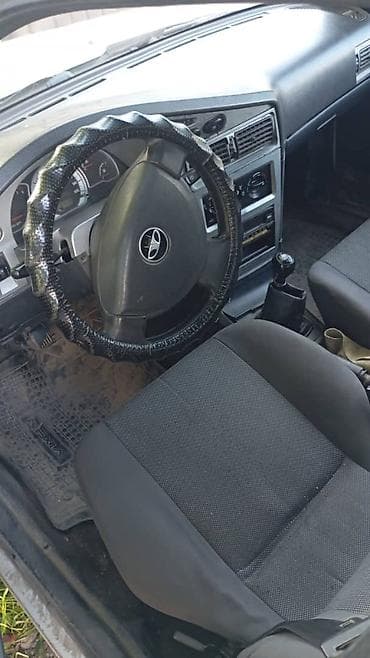 Daewoo Nexia: 2010 г., 1.6 л, Кол менен иштөөчү, Бензин, Седан — 2