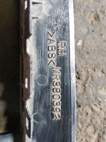 дом на кольосах: Mitsubishi Pajero IO кожух внутренней ручки, Митсубиси Паджеро Ио — 3