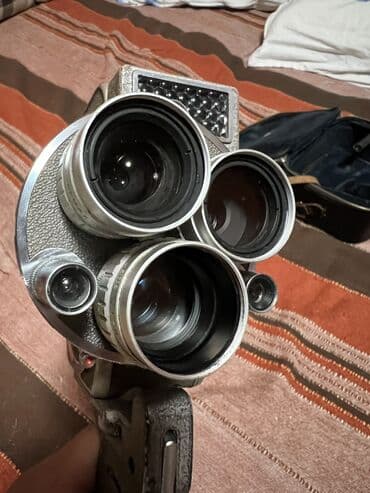 раритетный фотоаппарат: Японская крутая пленочная кинокамера 1950 года выпуска, с чехлом — 2