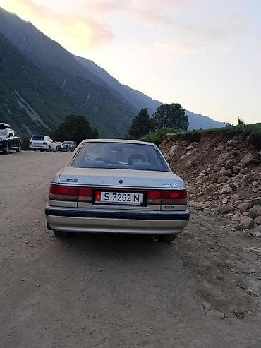бампер 124 ош: Mazda 626: 1990 г., 2.2 л, Механика, Бензин, Седан — 6