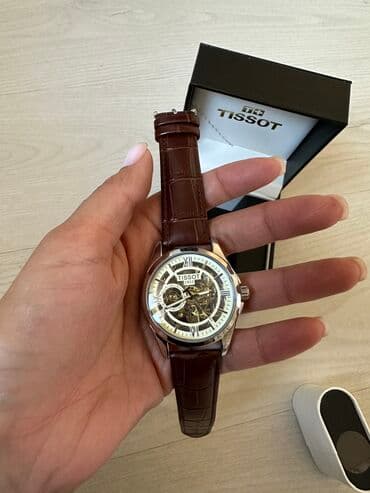 где можно продать наручные часы: Механика
Без батарея 
Ремень кожа 
В комплекте коробка — 5