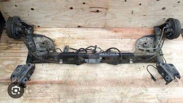 марч центр: Задняя балка моста, предназначенная для автомобильной подвески. Этот