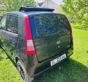 100 с4: Daihatsu Cuore: 2004 г., 1 л, Ручные, Бензин, Хэтчбэк — 8