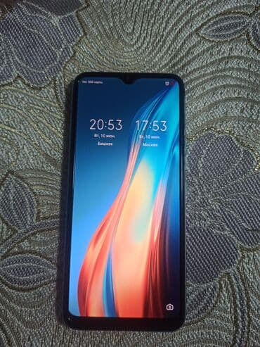 телефон в таласе: Tecno Spark, 32 ГБ, цвет - Голубой — 1