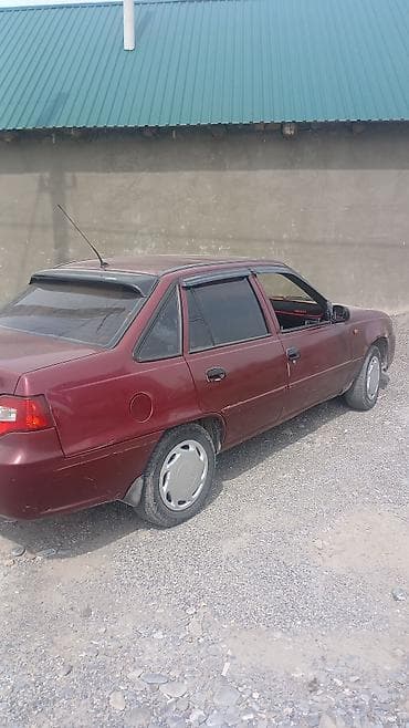 Daewoo Nexia: 2011 г., Седан — 6