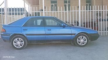 bid e2: Mazda 323: 1992 г., 1.6 л, Автомат, Бензин, Хэтчбэк — 8