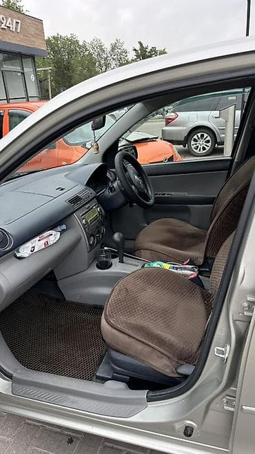 чехлы на стул: Mazda Demio: 2004 г., 1.3 л, Автомат, Бензин, Хэтчбэк — 4