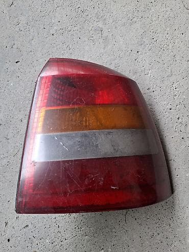Стоп фара Опел Астра G
Правый