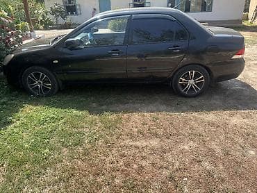 windom 2001: Mitsubishi Lancer: 2005 г., 1.6 л, Автомат, Бензин, Седан — 3