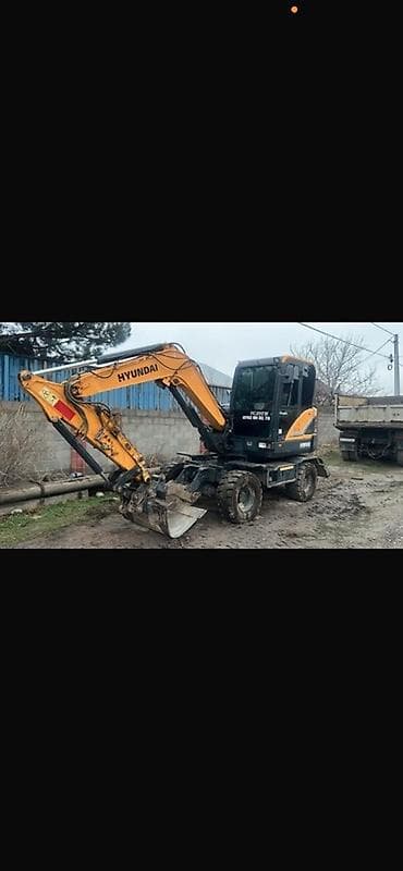 операторский кран аренда: Экскаватор, Hyundai, Колесный — 1