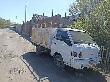 Унаа: Грузовой мини‑грузовик Hyundai Porter (кабовер), белый цвет, бортовая — 2