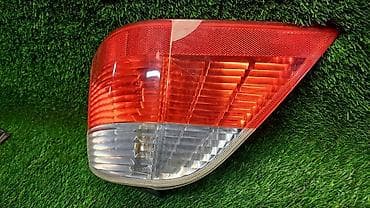 е61: Фонарь задний левый Е61 6 935 319 Год 2004 В отличном состоянии — 2