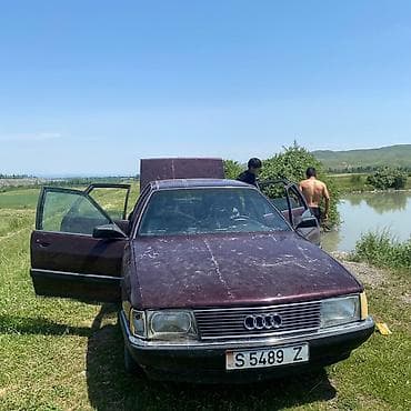 рага авто: Audi 100: 1990 г., 1.8 л, Кол менен иштөөчү, Газ, Седан — 10