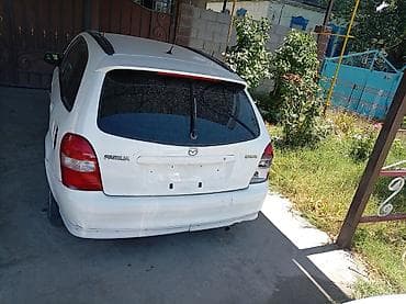 габариты: Mazda Familia: 2000 г., Универсал — 1