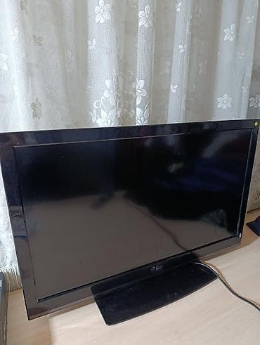 Телевизор LG, размер (75/47см). Плоская панель, глянцевая рамка