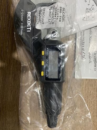 мерительный инструмент: Это цифровой микрометр. Он используется для очень точного измерения — 2