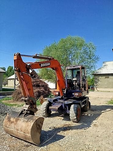 катер водный: Экскаватор, Doosan, Колесный — 2