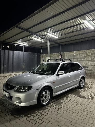 кондидер: Mazda 323: 2002 г., 2 л, Механика, Бензин, Хэтчбэк — 3