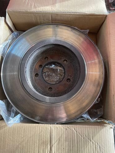 перфорированные тормозные диски: Предний тормозной диск BMW 2003 г., Оригинал — 1