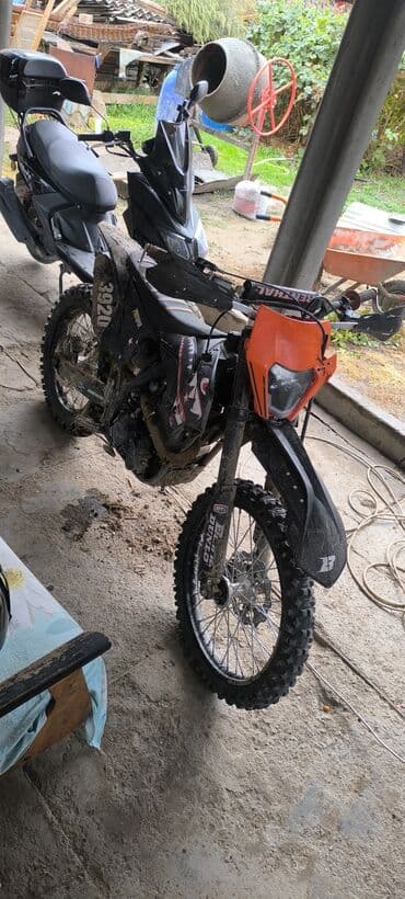 Oldsmobile: Эндуро мотоцикл Zuumav К5, оранжево‑черный. Основные особенности: - — 2