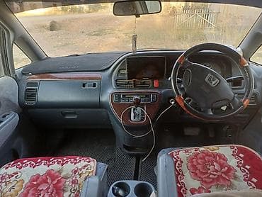 Honda: Honda Odyssey, правый руль, черный минивэн. Основные особенности: - — 3