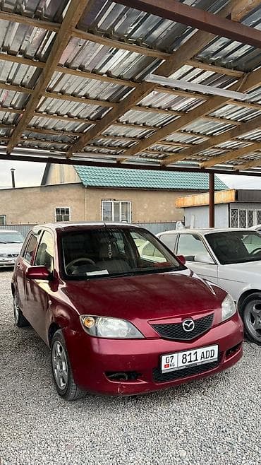 Mazda Demio: 2002 г., 1.3 л, Вариатор, Бензин, Хэтчбэк at lalafo.kg Mazda Demio: 2002 г., 1.3 л, Вариатор, Бензин, Хэтчбэк