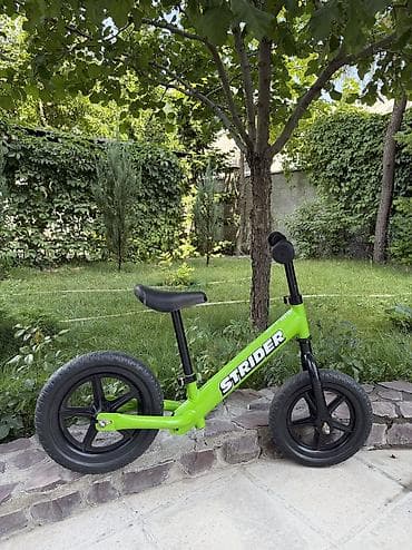 Детский транспорт: Беговел Strider, зеленый. Состояние новое, ребенок не заинтересовался — 2
