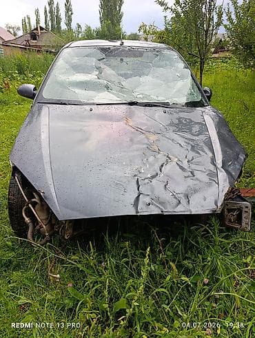 Унаа: Ford Focus I (хэтчбек, 5 дверей), темно‑серый, продаётся целиком под — 1